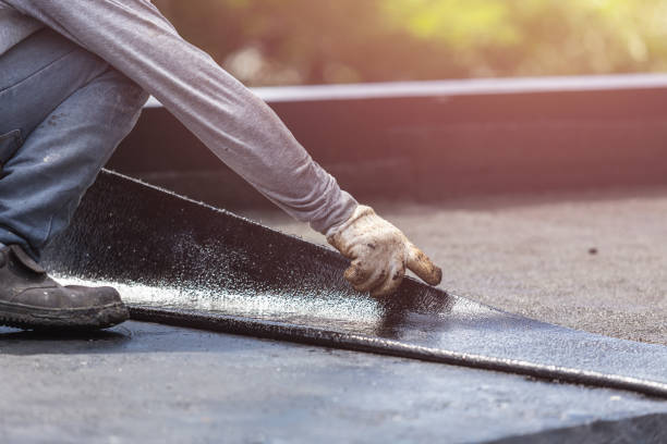 Professional Waterproofing technician working in Delevan, NY